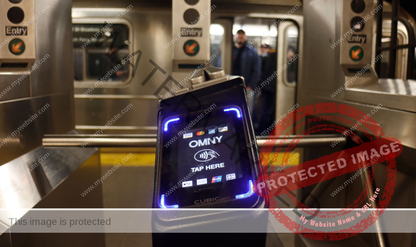 NEW YORK, NY - MARCH 5: An OMNY fare reader is pictured in front of a '1 line train at the Christopher Street subway station on March 5, 2023, in New York City. (Photo by Gary Hershorn/Getty Images)